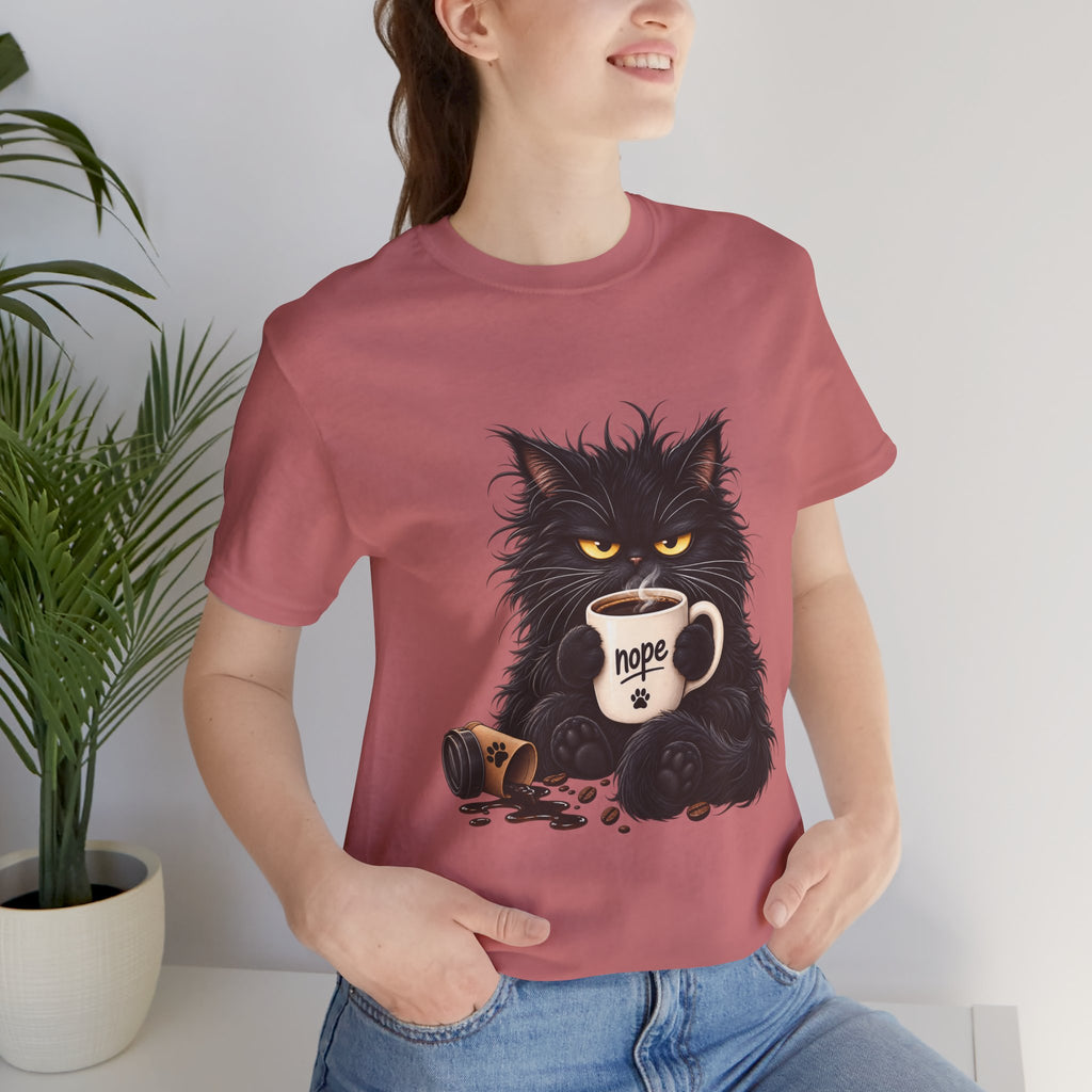 Nope Cat Coffee T‑Shirt — Grumpy Black Cat Holding 'Nope' Mug