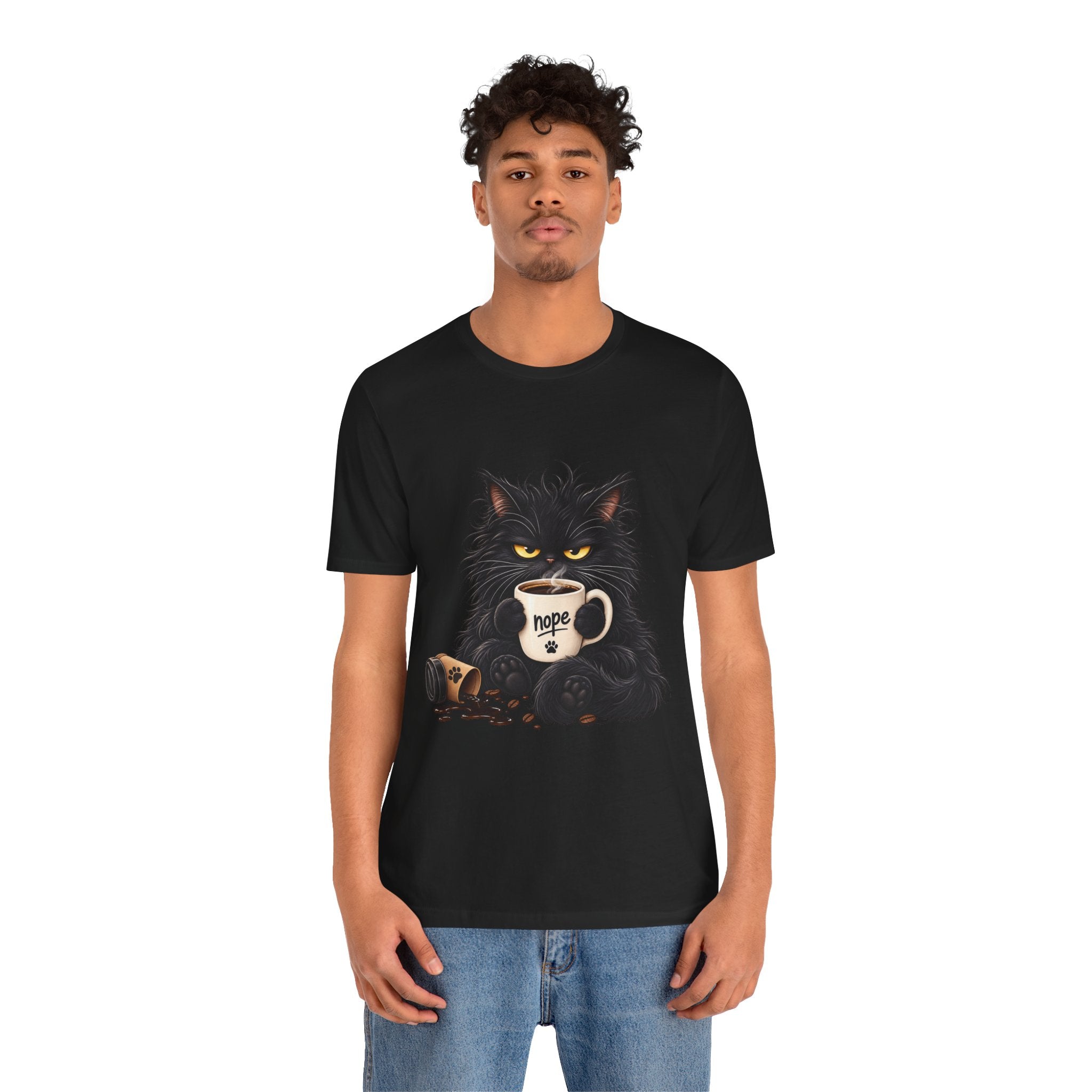 Nope Cat Coffee T‑Shirt — Grumpy Black Cat Holding 'Nope' Mug