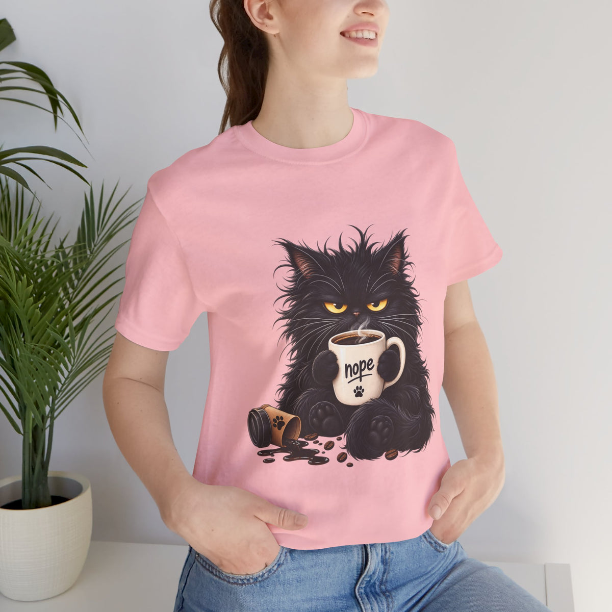 Nope Cat Coffee T‑Shirt — Grumpy Black Cat Holding 'Nope' Mug