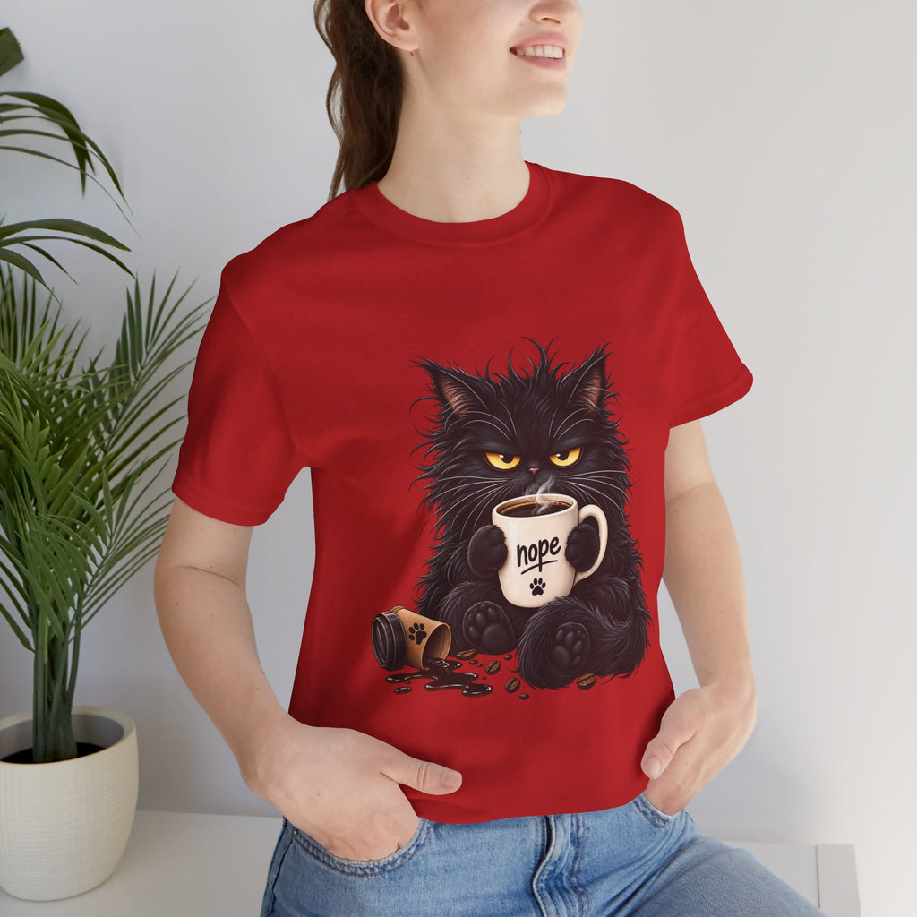 Nope Cat Coffee T‑Shirt — Grumpy Black Cat Holding 'Nope' Mug