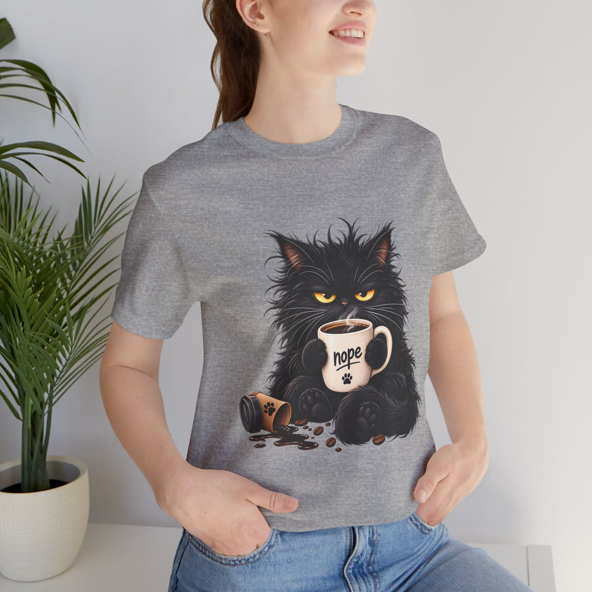 Nope Cat Coffee T‑Shirt — Grumpy Black Cat Holding 'Nope' Mug