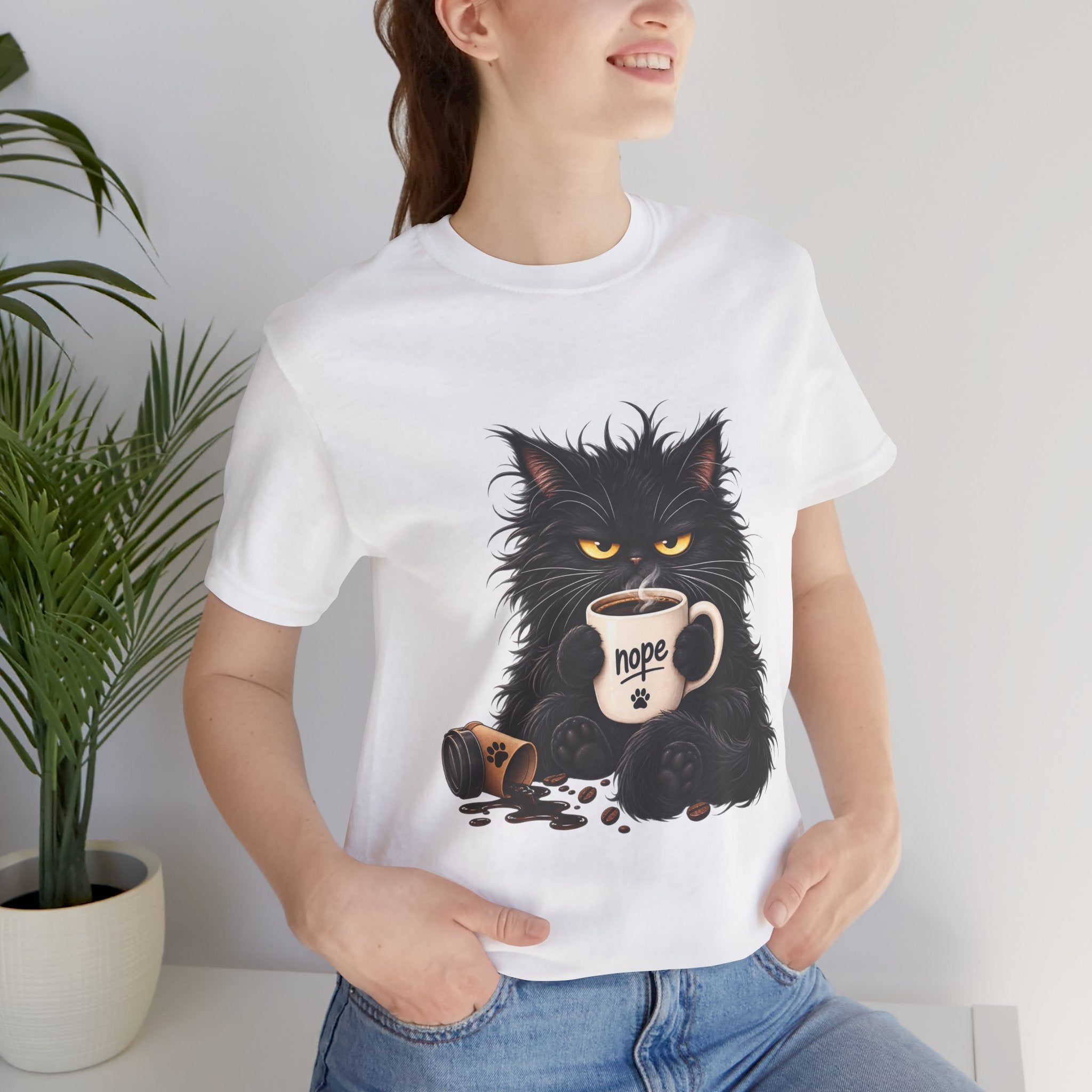 Nope Cat Coffee T‑Shirt — Grumpy Black Cat Holding 'Nope' Mug