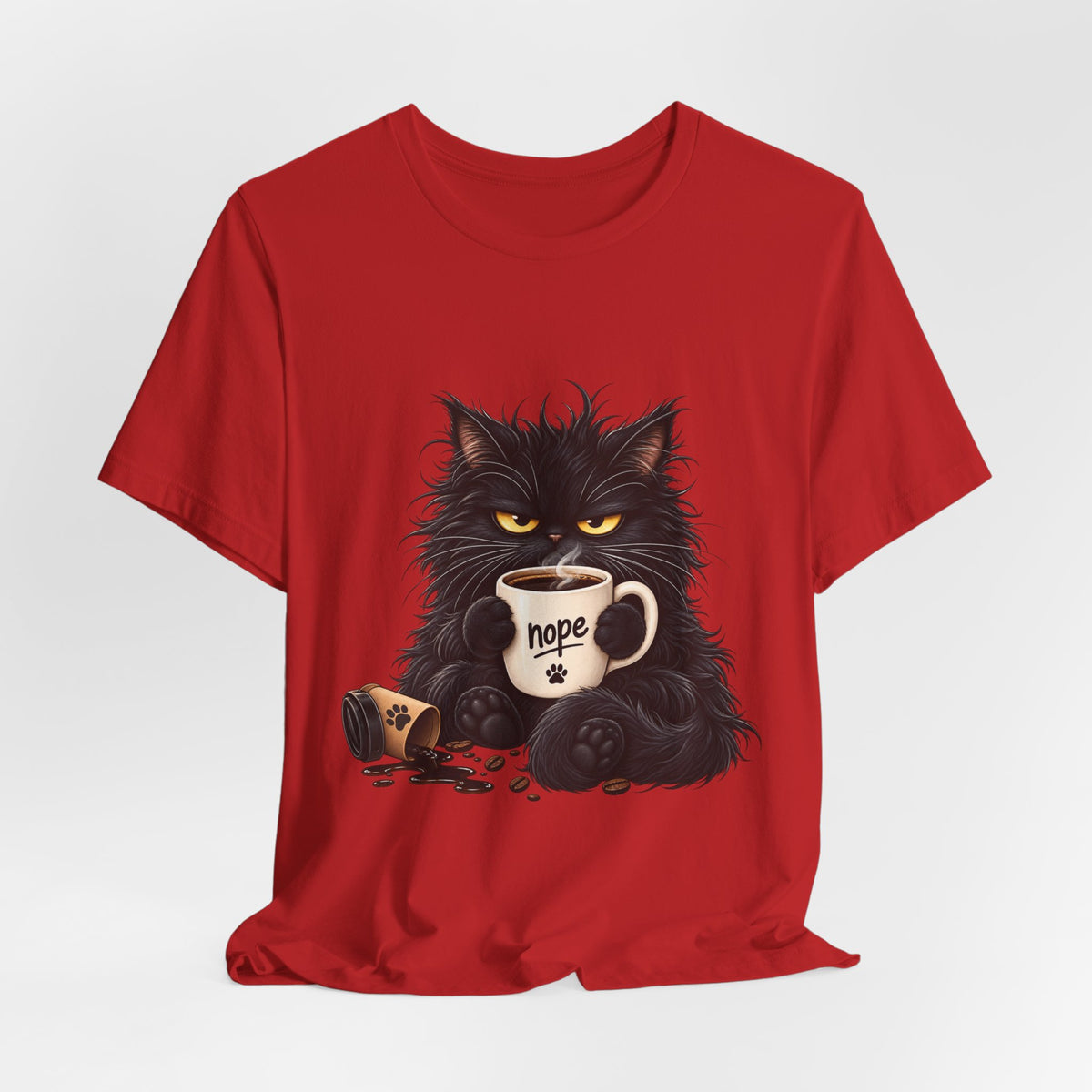 Nope Cat Coffee T‑Shirt — Grumpy Black Cat Holding 'Nope' Mug